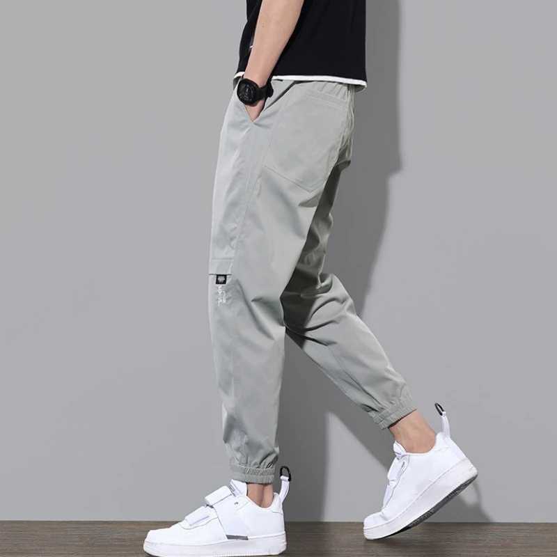 Pantalon des hommes couleurs de couleur élastique pantalon hommes pantalon de cargaison à bandes à la cheville pour usure quotidienne ColorXJ2411