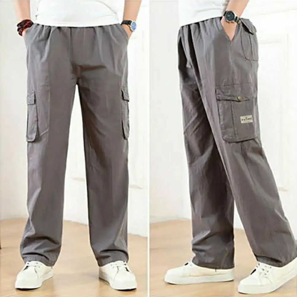 Pantalon de couleur un pantalon de quotidien décontracté pantalon de streetwear masque large avec des poches de taille élastique LTI pour confort