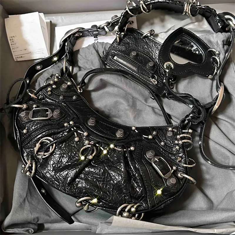 Sac chaud Le Cagole Femmes Designer Sac à épaule Luxury Half Moon Sac Motorcycle Sac Dumpling Sac de mouton de mouton