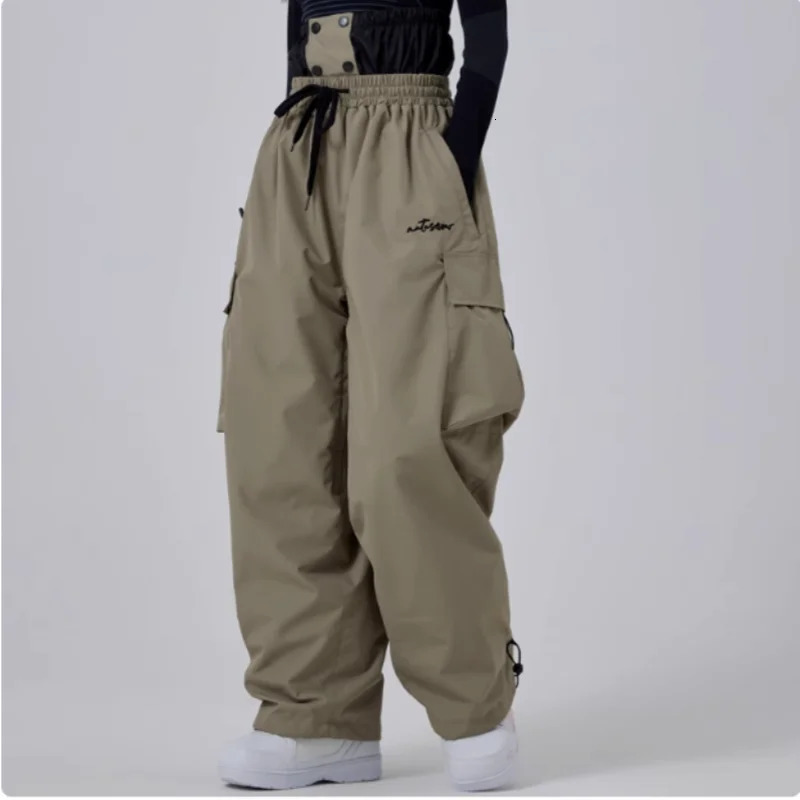 2025 Men Women Baggy Ski Pants Waterproof 15000 Windproof Loose Snowboarding Pants Snowpants Outdoor Hip-hop Ski Cargo Pants 241126