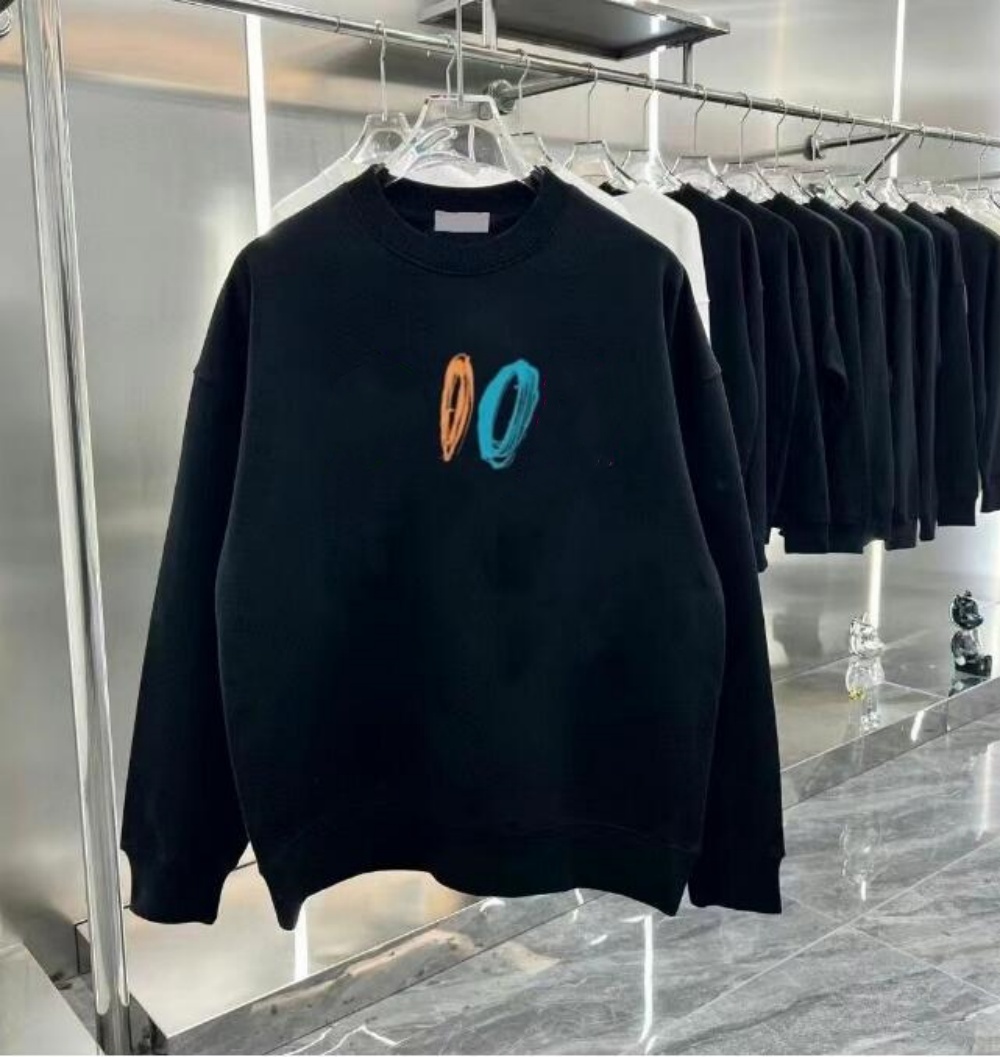 Printemps et automne Nouvelle marque à la mode décontractée à la mode en vrac à sweat à sweat à sweat à sweat imprimé de cou rond Men et femme po