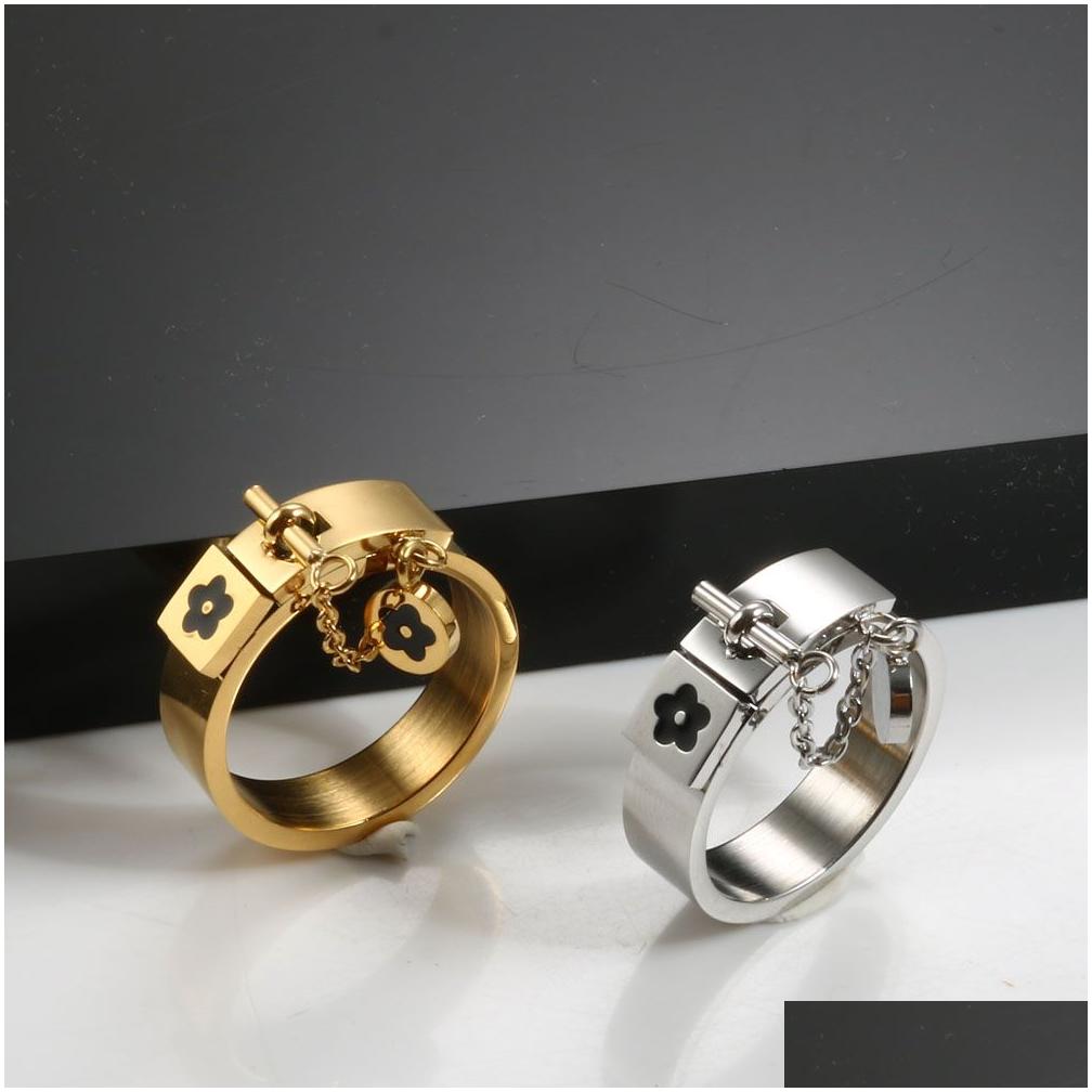 fashion lucky flower charm with chain ring gold/sliver stainless steel love promise finger rings for women men jewelry gift