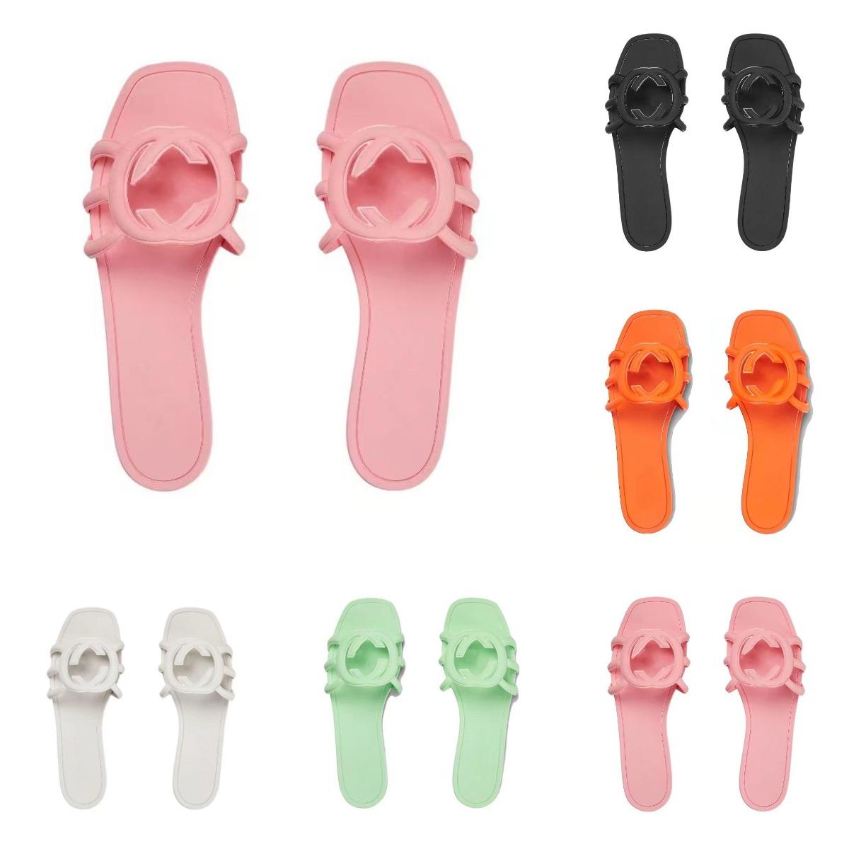 2024 Designer Sandales Femmes Interdécker les glissades Fashion Pantoufles en caoutchouc Ladies Flat Beach Jelly Script Orange Summer Fall Mules