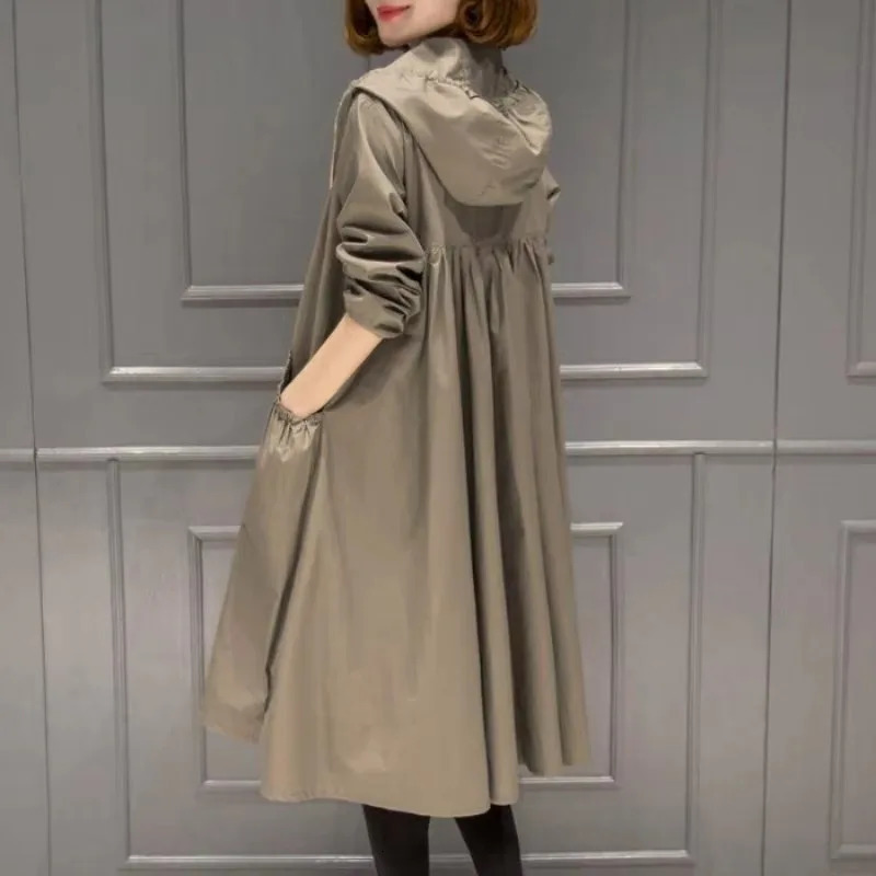 Womens hooded trench coat with spring and autumn long sleeved zipper top Korean style loose solid color womens trench coat 240929