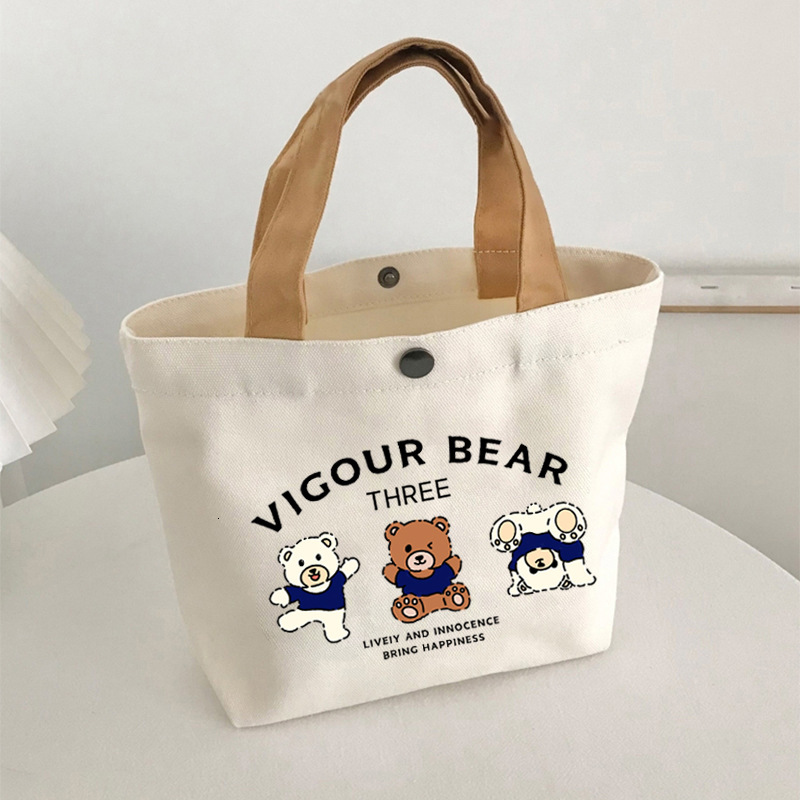 Nouveau modèle nouveau sac de designer Portable Tendance Canvas Gift Leisure Compact Office Wrap Small Bento Sac à main