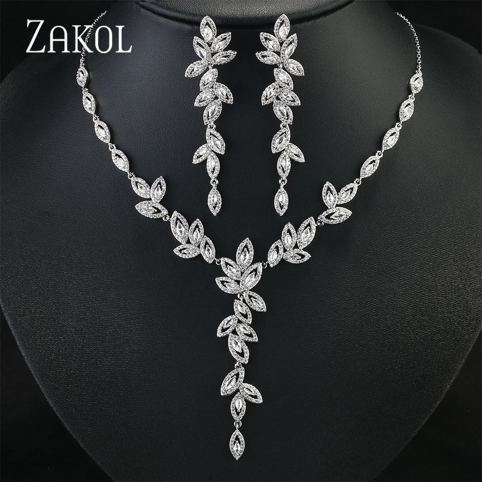 Zakol 3 pièces étincelant tous les bijoux en zircon adaptés aux boucles d'oreilles / colliers / bracelets exquis des femmes bijoux de mariage typ
