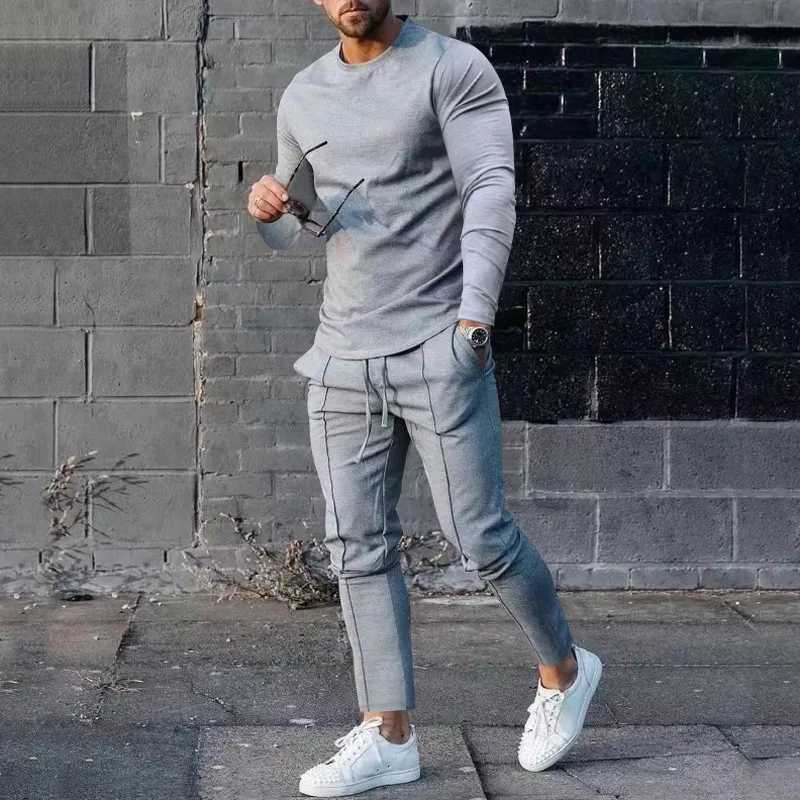 Spring and autumn fashion round neck solid color long sleeved brushed mens clothing Korean foot binding sports trend Y2K pants set W241008