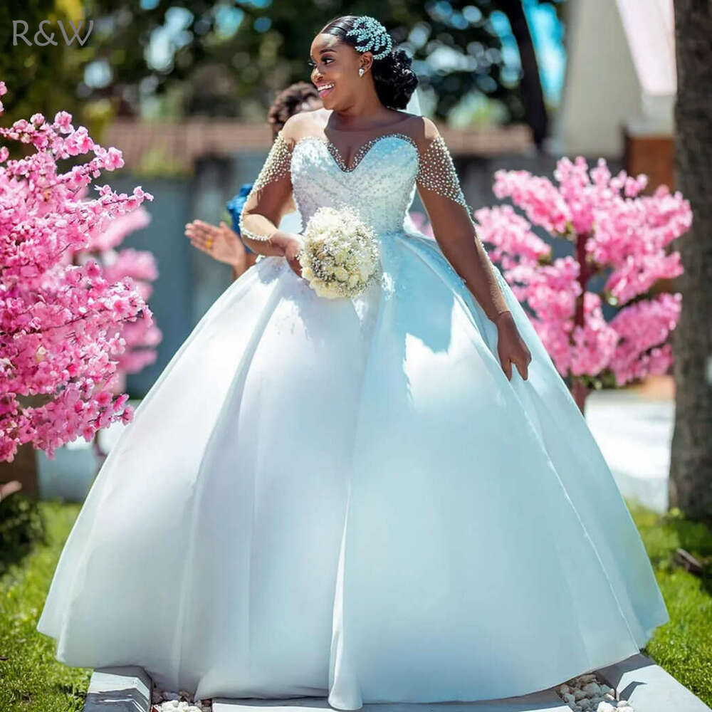 Rw 2024 Robes Aso Ebi pour la mariée Couper Long Manches à manches longues Princesse Queen Dobe Bridal Perles Perles Robe de mariée pour les femm