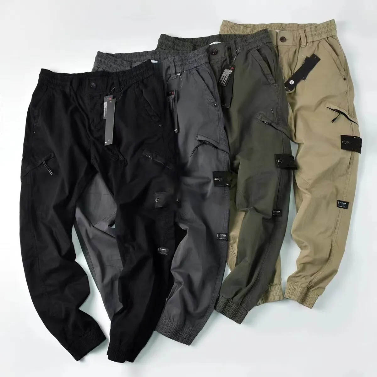 Patches de badge de haute qualité pour hommes Track Stone Pant de mode lettres de mode de créateur en pierre Pantalon de cargaison Pantalon à fer