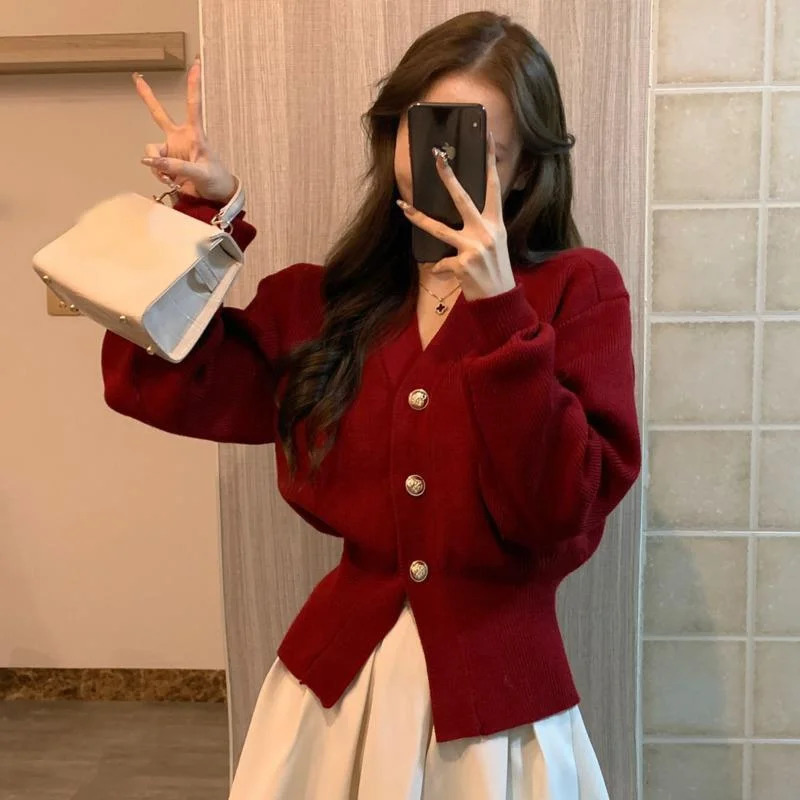 Automne Womens Fashionable Retro Chic Elegant Single Corte Tringan Cardigan OL V-Neck Puff à manches longues Pull tricoté solide ultra-mince 2409