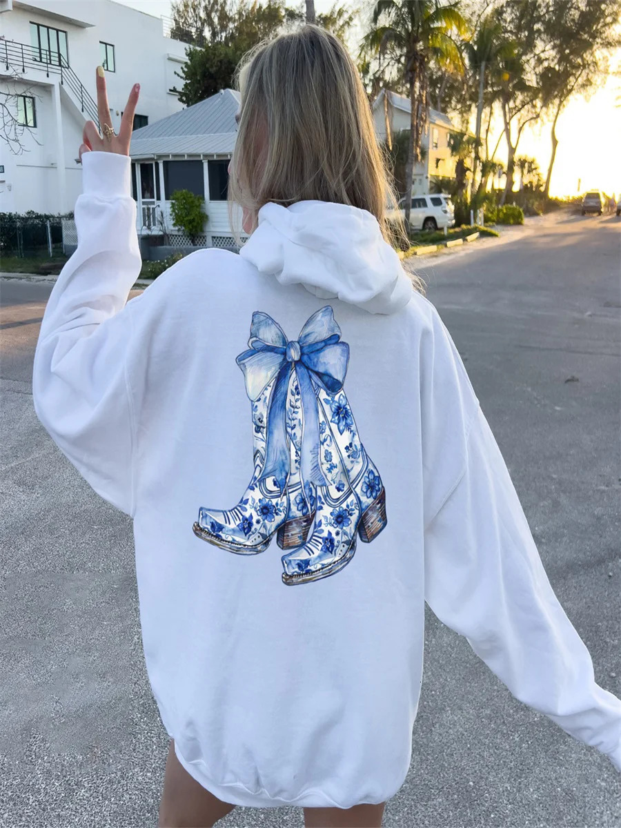 Womens super large hooded sweatshirt with bow details and graphic printed long sleeved pullover sweatshirt loose pockets casual fit 241010