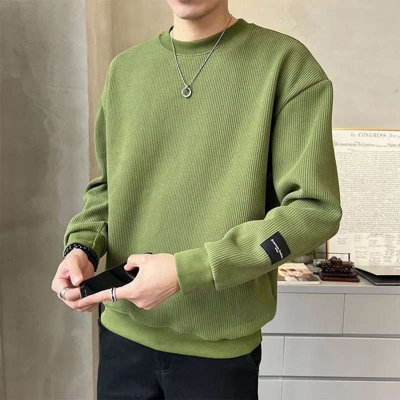 Spring and autumn fashionable round neck long sleeved solid color sportswear for men loose and casual Korean floral chic top 241010