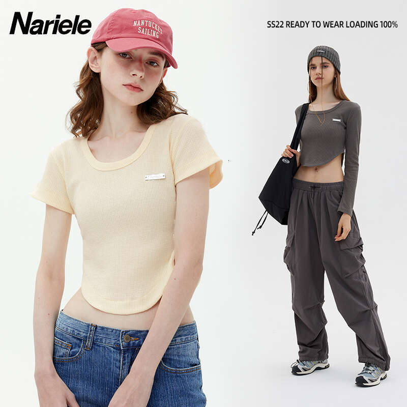 Best-seller Heyhenry Waffle Niche Design Ourlet irrégulier T-shirt à manches courtes coupe ajustée pour les femmes dans la tenue de fille épicée