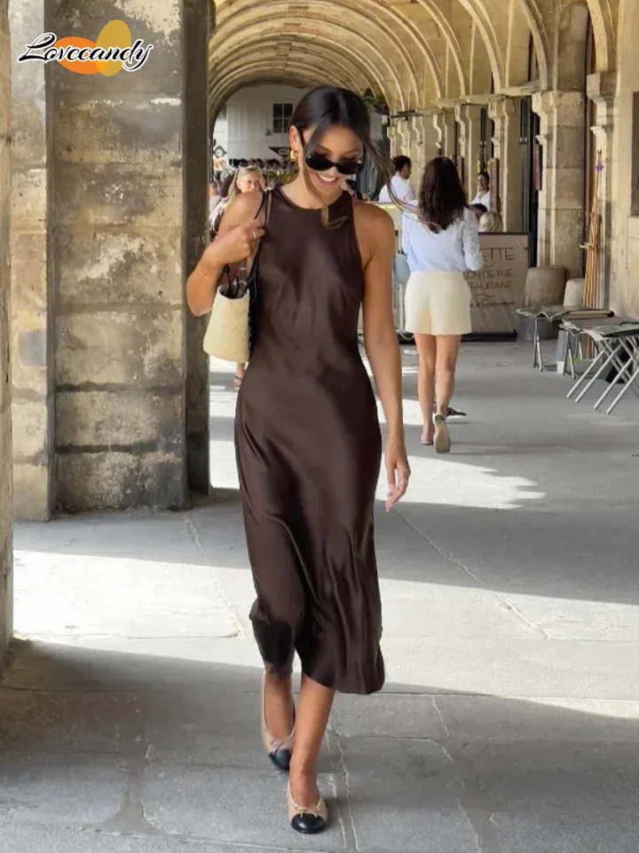 Robe satinée de couleur unie élégante pour les femmes à la mode rond sans manches à manches minces d'été