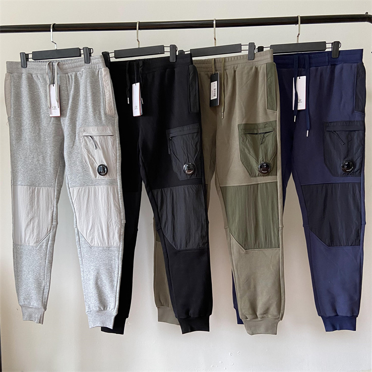 Autumn and winter men's thick velvet casual new pants with mobile badge trendy brand loose cotton sanitary one lens pocket pants