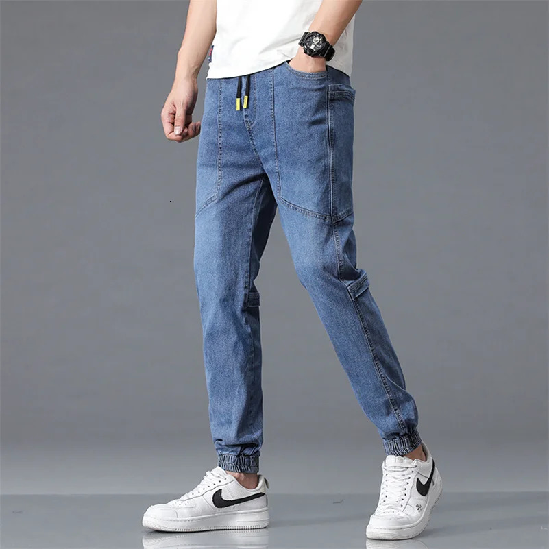 Spring automne hommes grand jogger de jogger jeans décontracté streetwear noir pantalon de cargaison de denim bleu noir