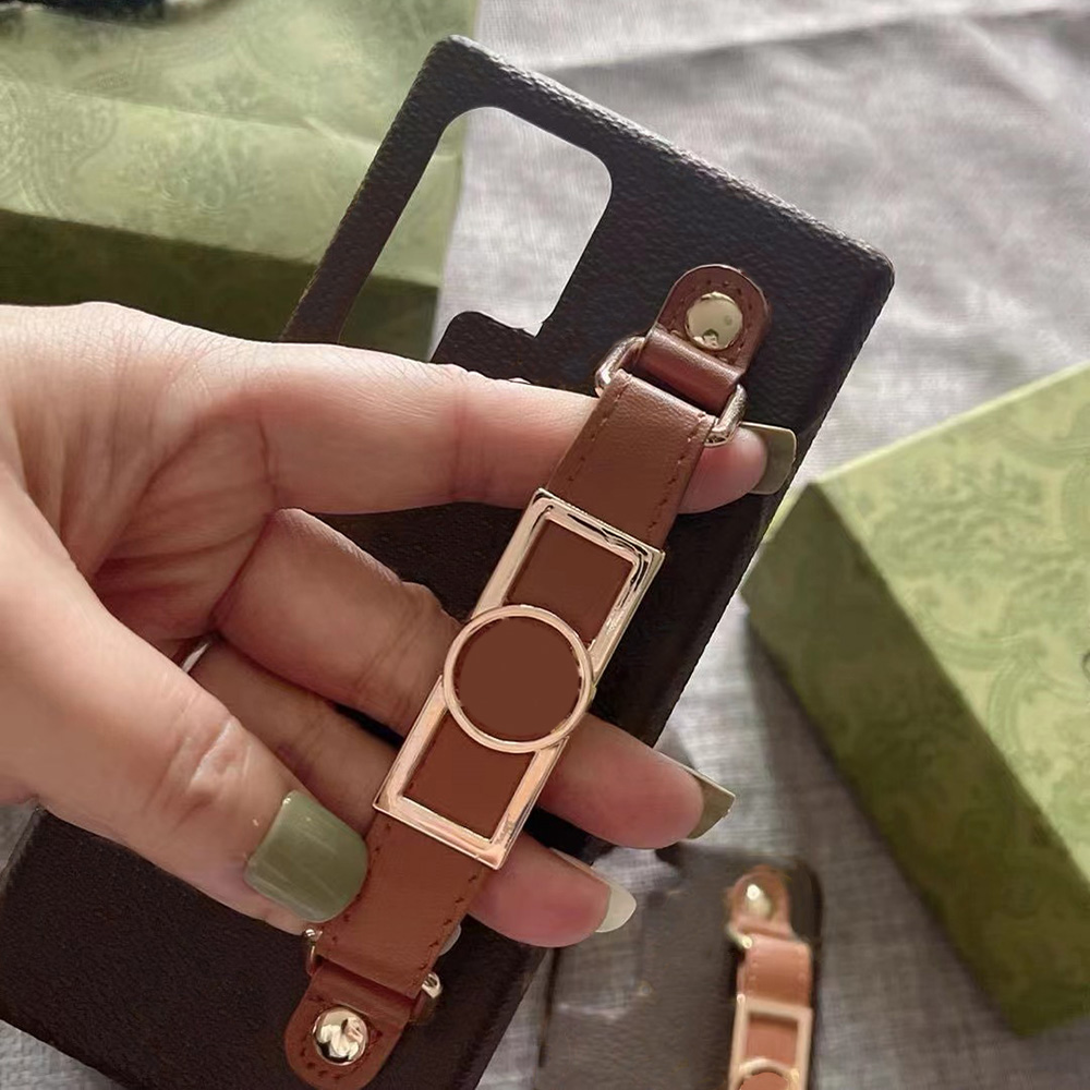 Wristband Designer Phone Case for Samsung Galaxy S25 S24 S23 S22 Plus S21 S20 Note 20 Ultra Luxury Leather Wrist Strap Velvet Lining Hardwares Ba-image-856509628