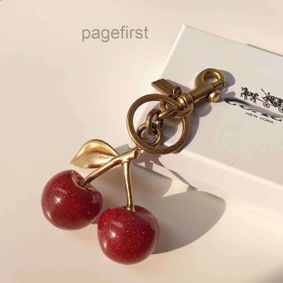 Designer Red Pink Cherry keychain bag charm for women Luxury brand key decorative pendant accessory girls like classic metal buckle ring with box