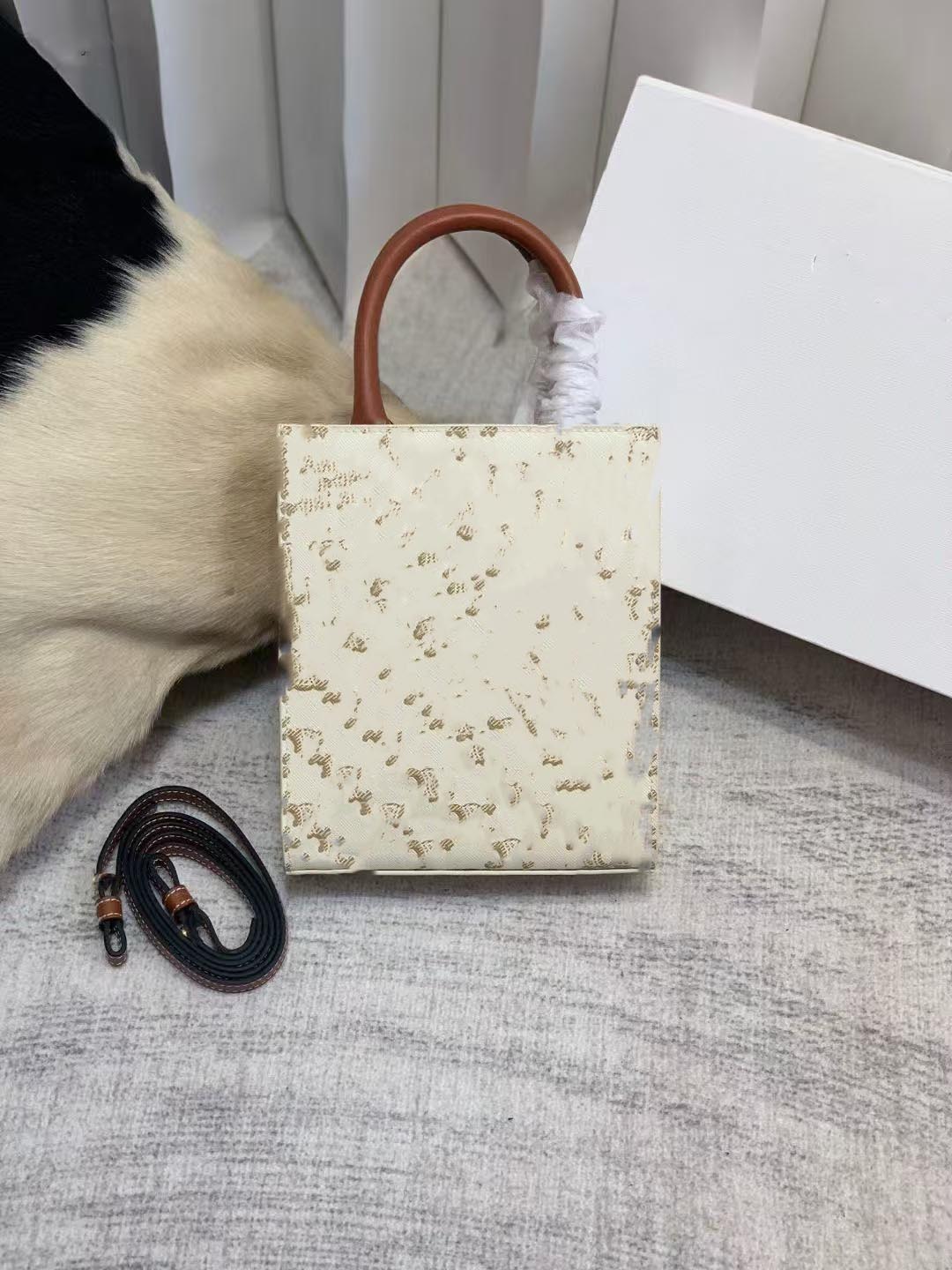 2023Designer Sac dames rabat à bandoulière Canvasjk authentine cuir tote sacs classict lettre imprimés de la remise en épaule chaîne35nyibbui