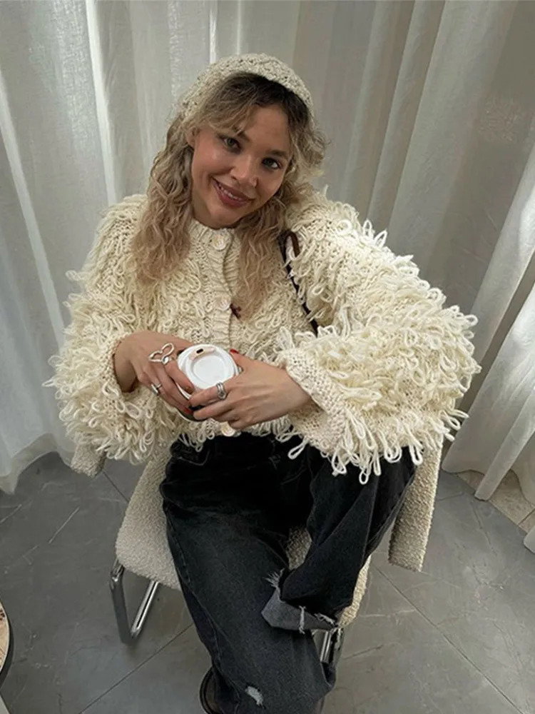 Tassel knitted cardigan womens street chic O-neck long sleeved womens sweater autumn and winter single chest loose womens coat 241019