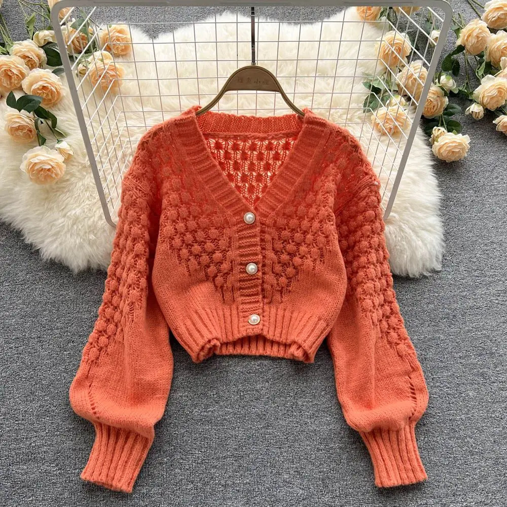 Knitted cardigan womens autumn and winter item Korean version V-neck sense hollow short sleeved small style 241022