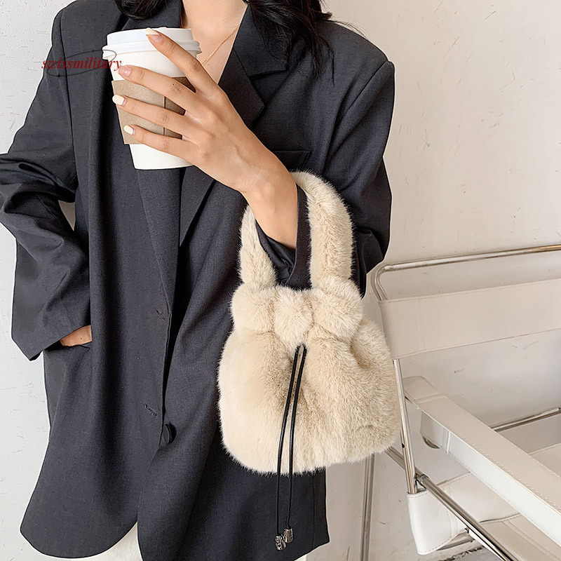 Automne et hiver nouveau seau portable de mode coréen avec cordon de cordon simple un sac en peluche croisé oblique pour les femmes # 30 Swissmil