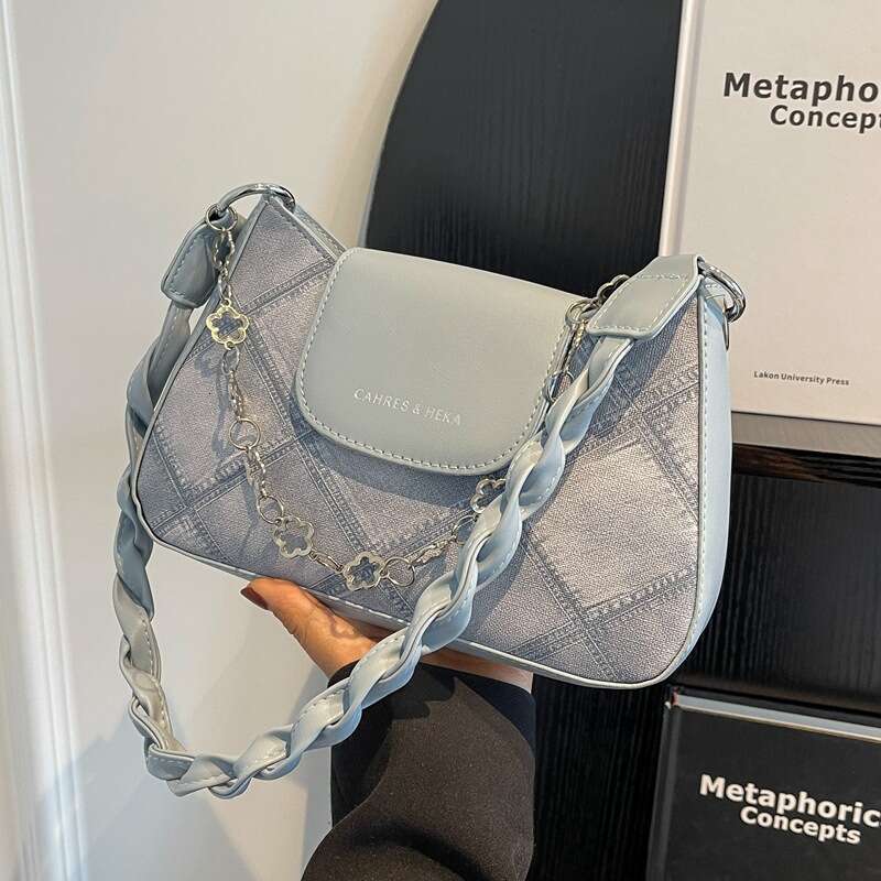 Le nouveau sac à bandoulière tendance et polyvalent pour femmes populaires de cette année 2024, texture haut de gamme, sac à aisselle à bandouliè