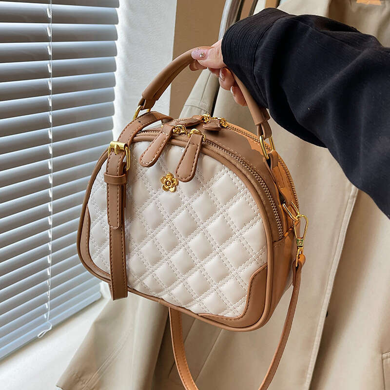 Fil de broderie Lingge pour les femmes 2024 Nouveau sac à bandoulière à la mode et polyvalent, sac à main populaire petit sac rond