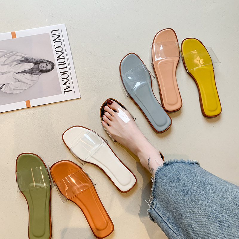 Les pantoufles portent le printemps et l'été nouvelle version coréenne des chaussures pour femmes mode flip-ps plateaux rouges transparents plats
