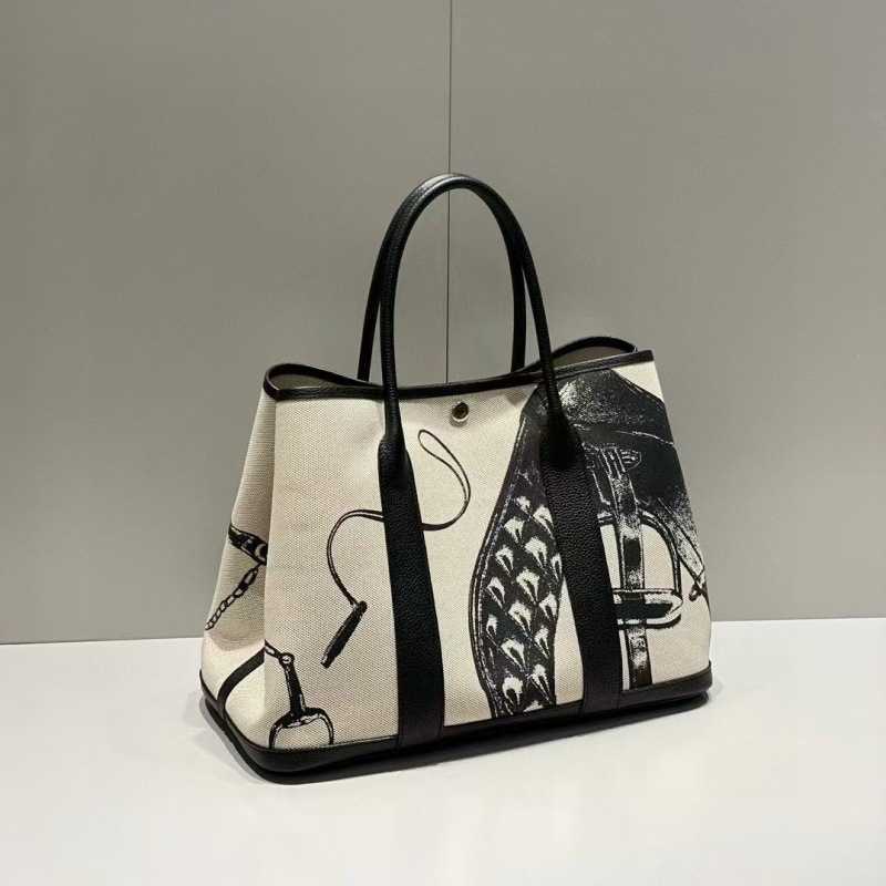 2024 Automne / hiver Graffiti Paindre illustration toile épisser la tête de tête de la tête de vache sac de jardin en cuir authentique en cuir si