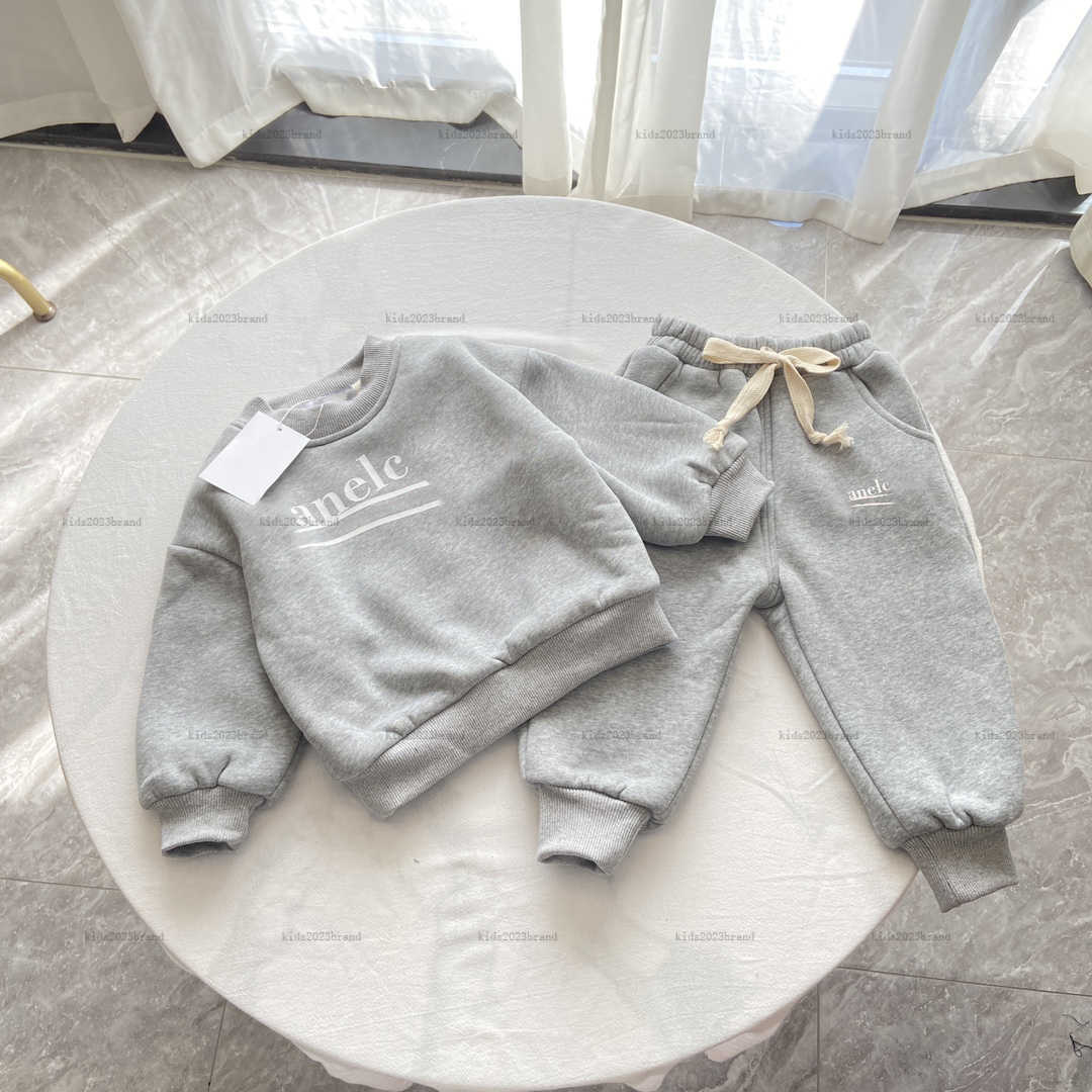 Nouvelles ensembles de chandails de survêtement pour bébé ajoutant du velours à l'intérieur du costume de sport automne à sweat à capuche de créa