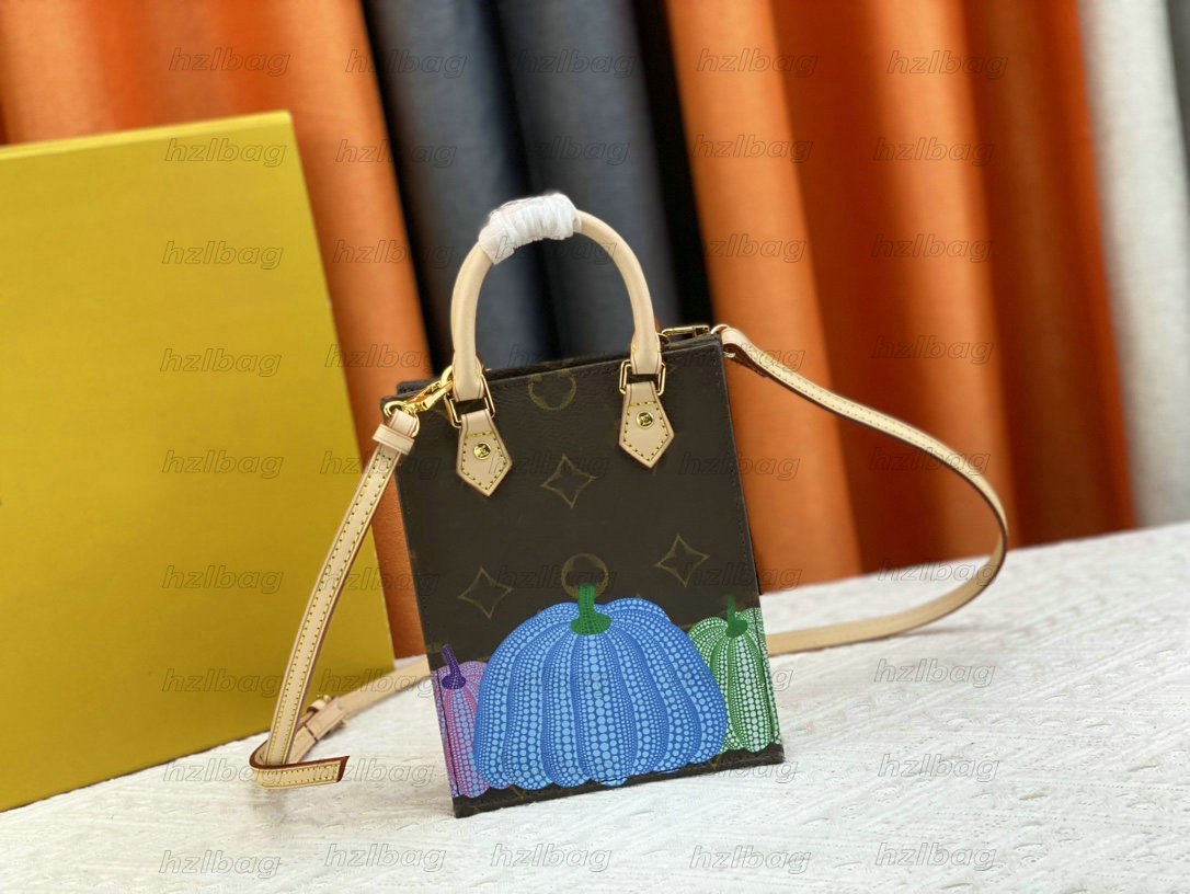 M82112 YK Petit Sac Plat Pumpkin Gradient Mini Tote Femmes Luxury Clutch Canvas Leather YK Sheet Mode créateur de mode