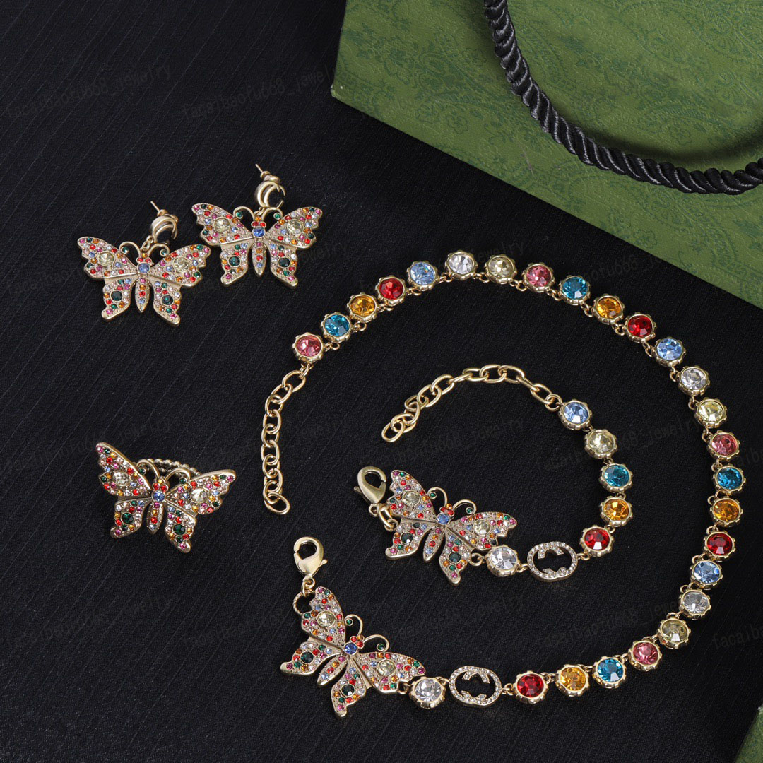 Boucles d'oreilles de créateurs, colliers, bracelets, bagues, matériau en laiton intégré zircon coloré et cristal double alphabet papillon élémen