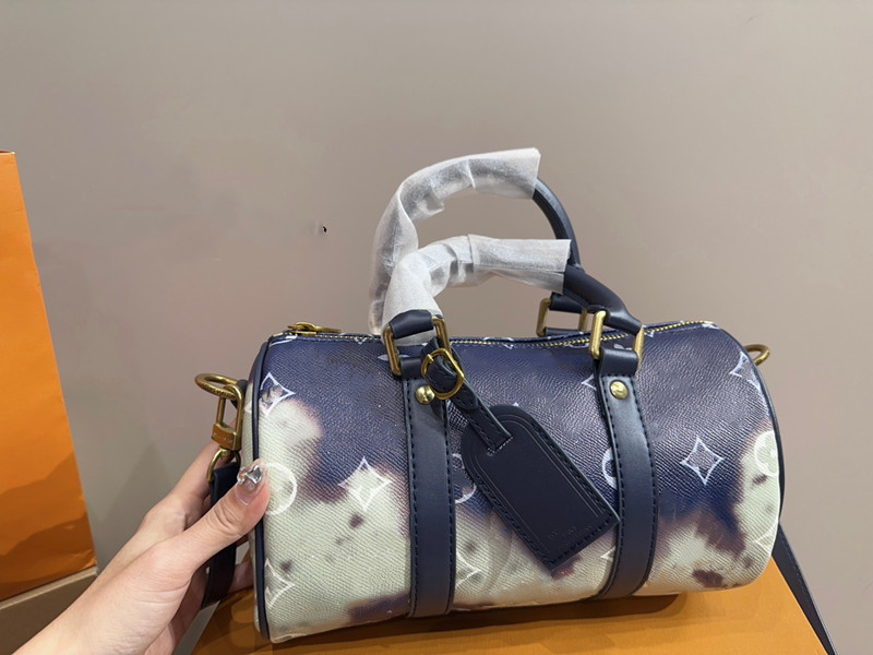 Créateur de mode Sacs Duffel pour hommes femmes bagages de voyage en plein air nanos crossbody mini sac en cuir denim bague