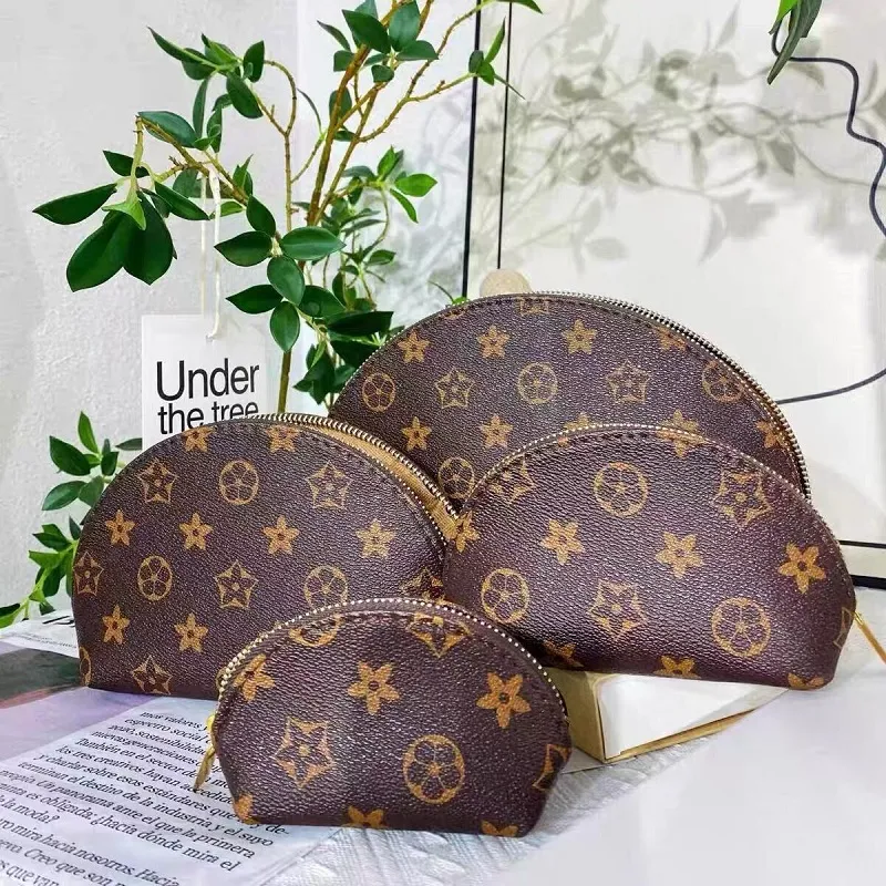 2022 Sacs à cosmétiques pour femmes Organisateur Sac de maquillage de marque célèbre Pochette de voyage de concepteur Sac de maquillage Dames Clu