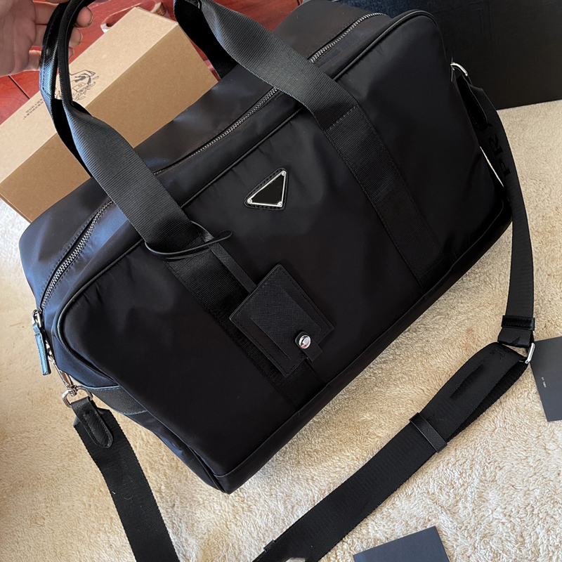 

Nylon Black Duffle Bag Luxury Bags Designer Trefoil Handbag Shoulder Womens Large Travelling Bowling Boston Bags Mens Women Handbags Outdoor, Black(correct letter)