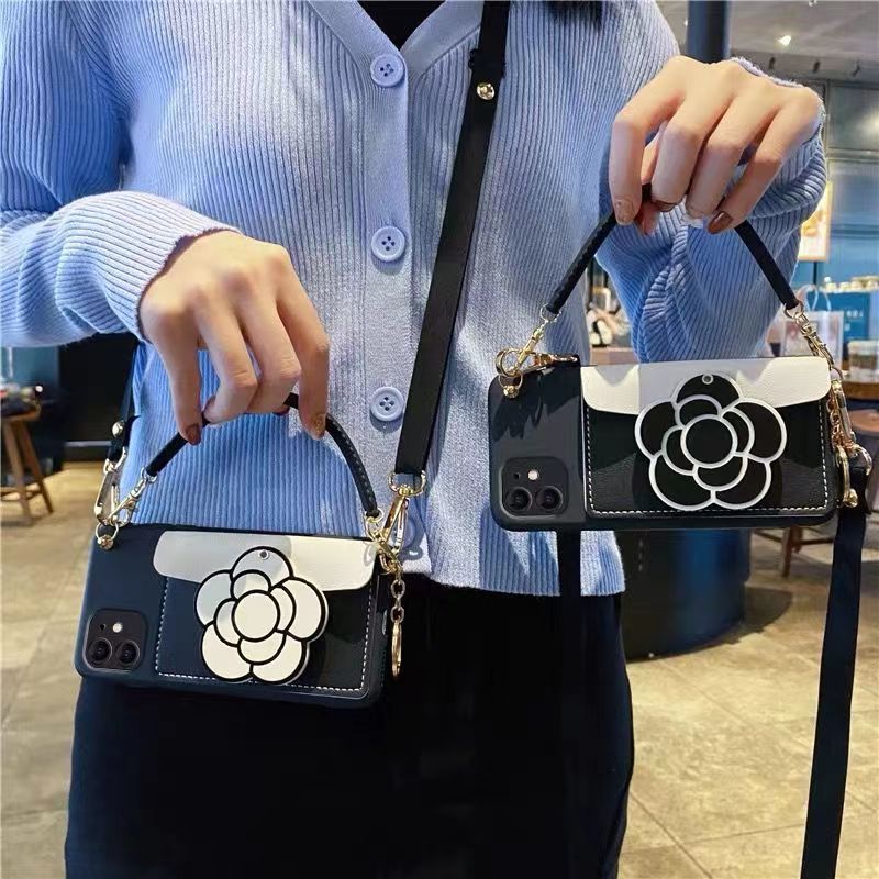 

Luxurys Designer Phone Case 12 12pro 11promax 13 13pro 13promax 14 13pro 14pro 14promax Flower two colours mirror insertable card case slash wrist strap, Black flower