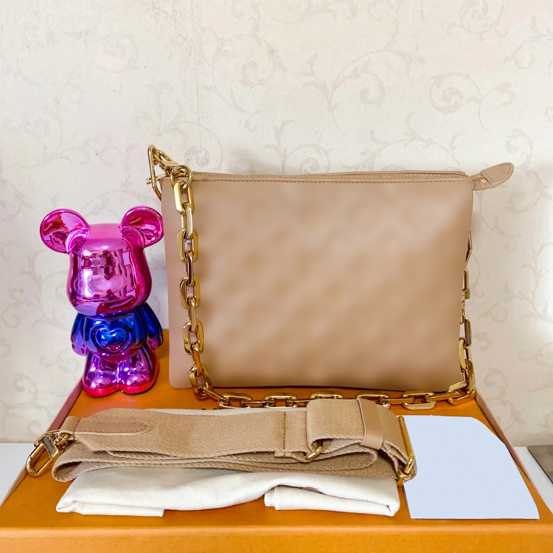 

famous cousin Fashion Luxurys Designer sling Embossing M57783 Clutch Bag Wallets handbags strap Genuine Leather Cross Body chain silver Evening classic city bags, White