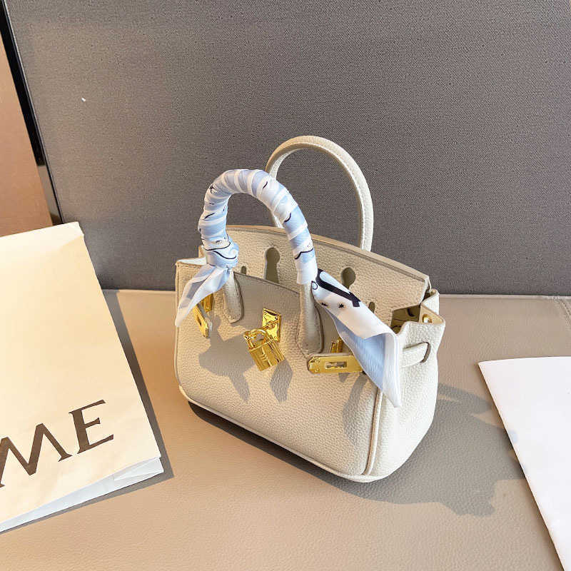 

Hong Kong Genuine Leather Fashion Bag This Year Premium Women 2023 New Autumn and Winter Handheld Crossbody, Milkshake white
