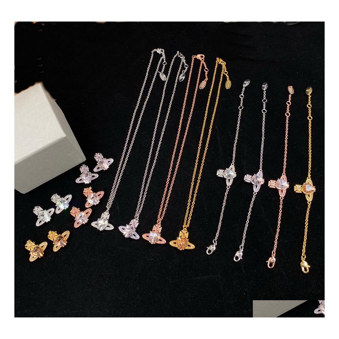 

Wedding Jewelry Sets Designer Ladies Necklaces Bangle Ear Studs Necklace Bracelets Earring With Blue Pink White Crystal Planet Penda Dh4Xi