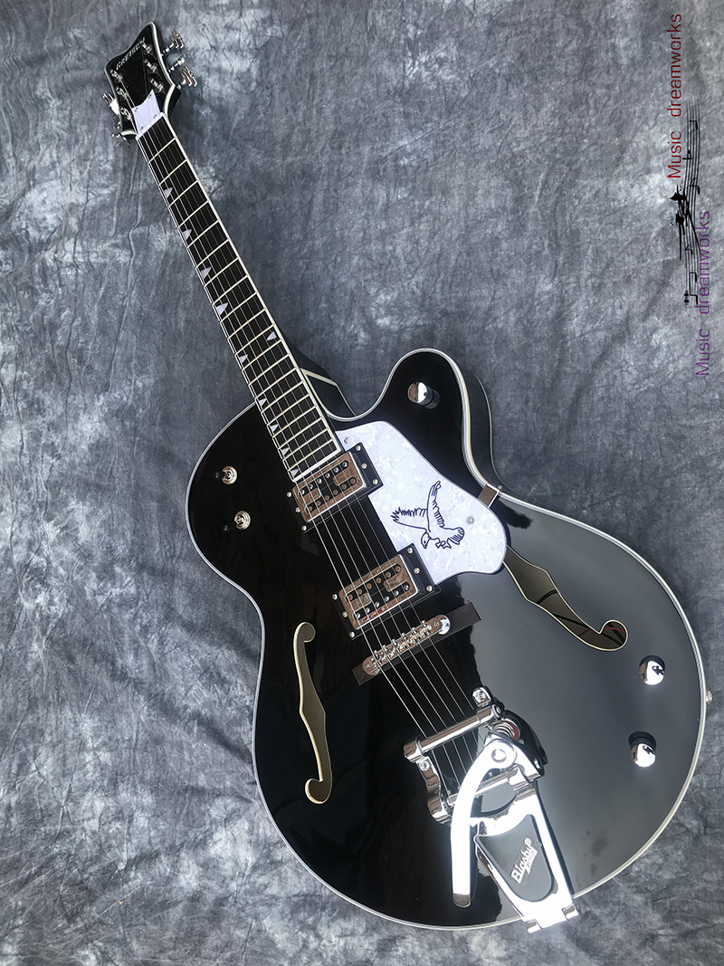 

Custom electric guitar, double f hole thick body jazz guitar, mahogany fingerboard, large vibrato bridge