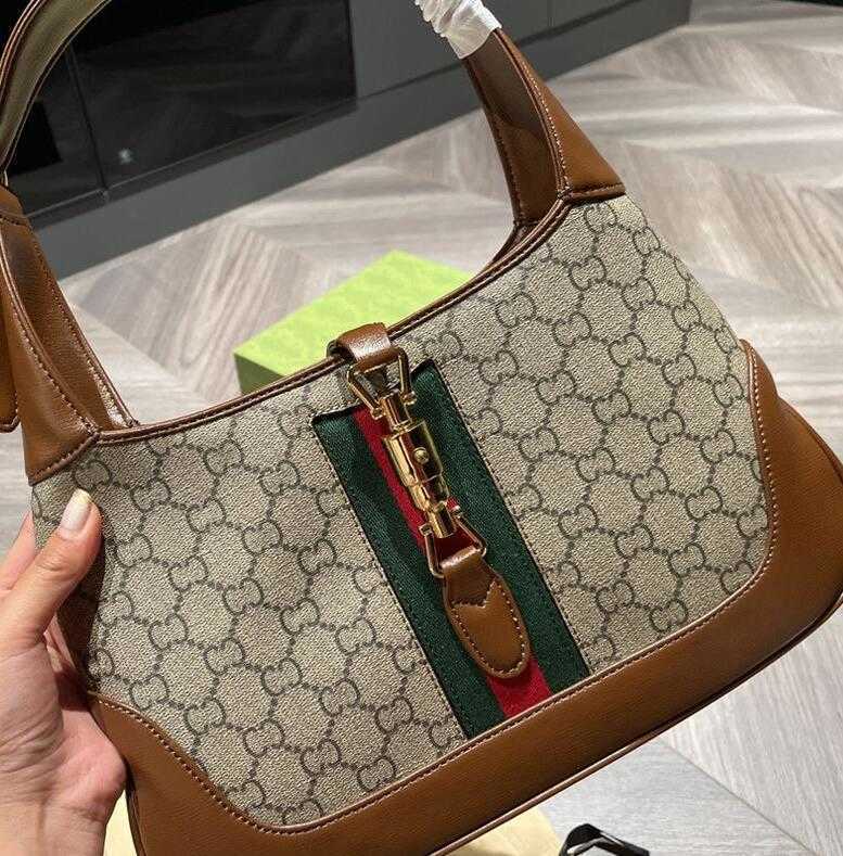sacs de créateurs Mode 2023 Sac à bandoulière pour femmes de luxe Cercle Garniture en métal Sac sous les bras 2022 qualité
