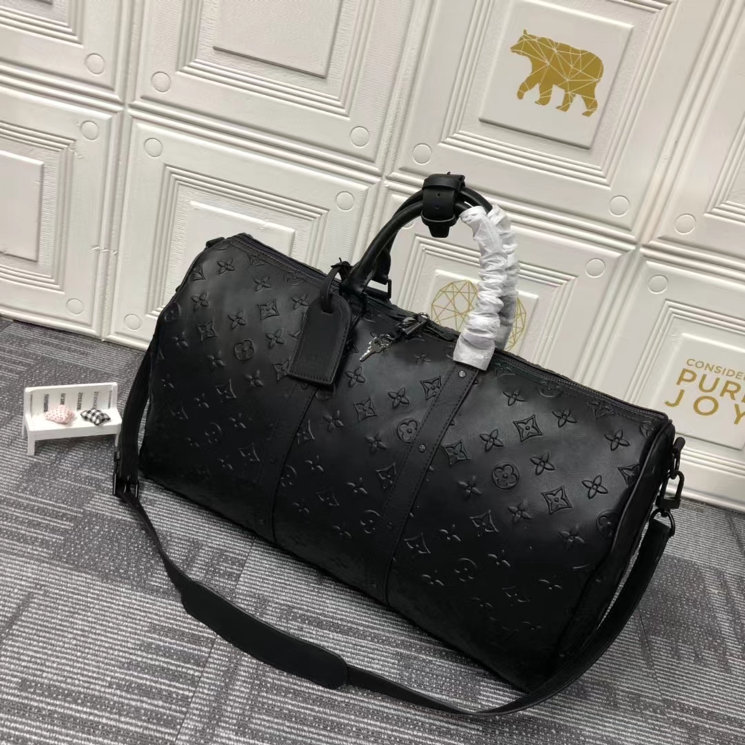 Designers Sacs Duffel 50 cm Luxury grande capacité Vente de voyage Femme Femmes Men de mode en cuir authentique Couptez des rivets avec une lettr