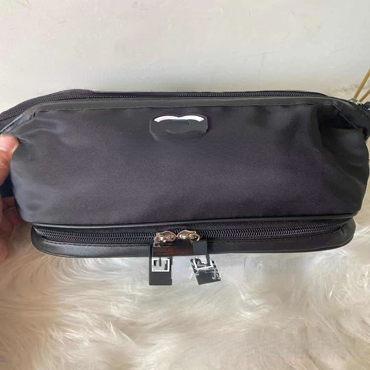 Sacs de cosmétiques de marque à tendance Les femmes lavent et le sac de maquille