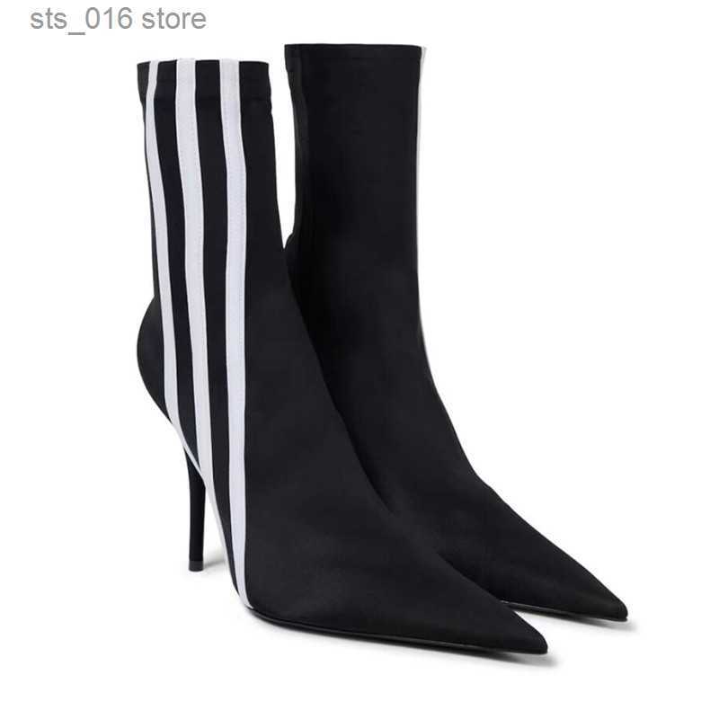 Bottes 2023 nouvelles bottes élastiques courtes quatre saisons de mode mince talon haut pointu rayure femmes sur les bottes au genou mode cuissar