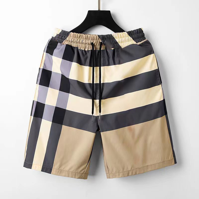 

2023 men's beach pants new trend in Europe and the United States casual fashion five-piece pants loose stripe four-bar color shorts, Apricot