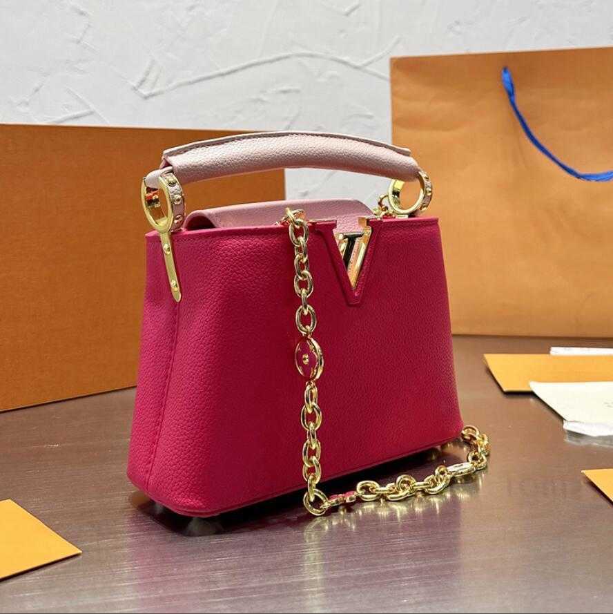 

Capucines Mini Leather Shoulder Bag for Women - Designer Tote with Crossbody and Clutch Options, 21cm Width, Make up the difference