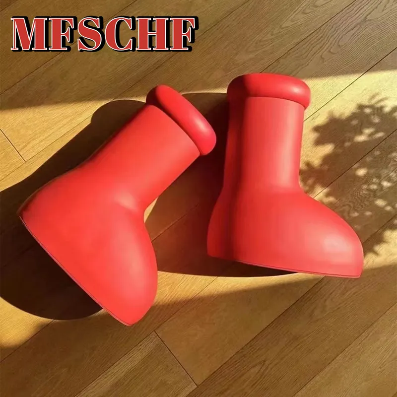 

Desgner MSCHF Big red boots Mighty Atom cartoon boot for men women fantastic rainboots into real life mens womens smooth rubber fashionb lJC