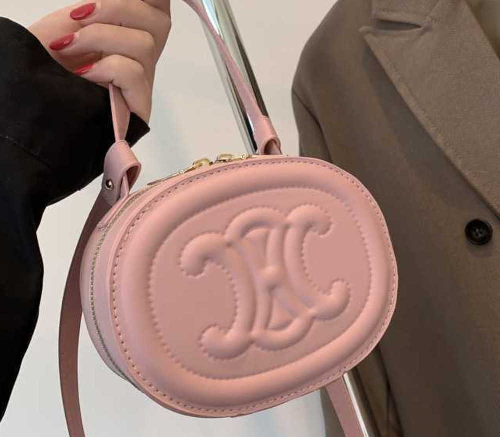 

2023 new designer summer single shoulder Crossbody small round bags fashion brand womens arch cute versatile bag, Pink9