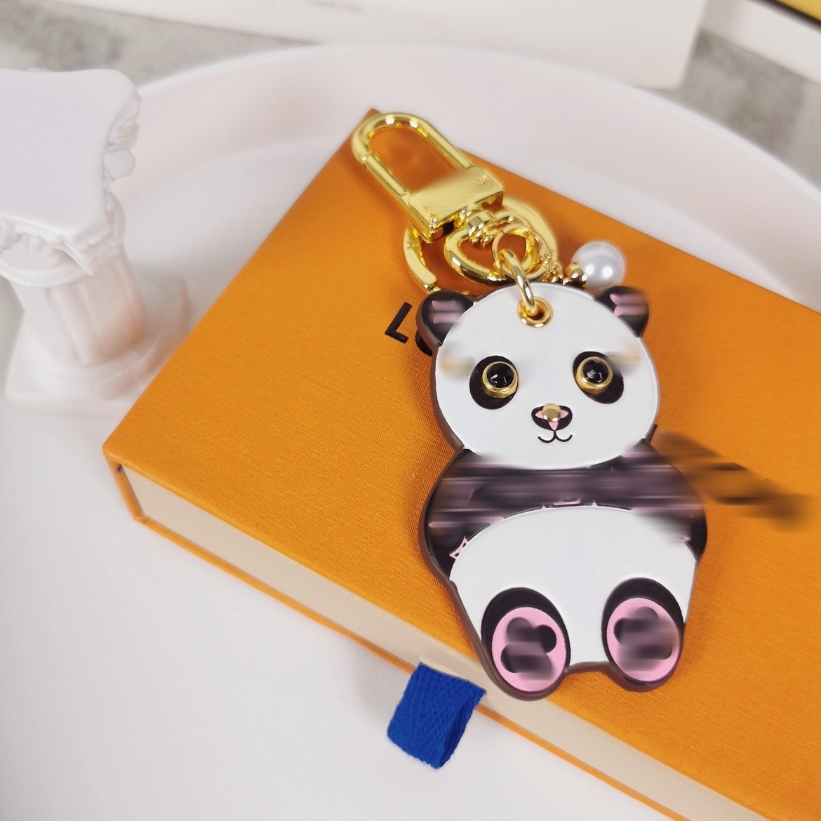 

Keychain Key Chain Buckle lovers Car Keychain Handmade Leather Keychains Men Women Bags Pendant Accessories with box and dust bag letters designer 45 Rabbit Panda